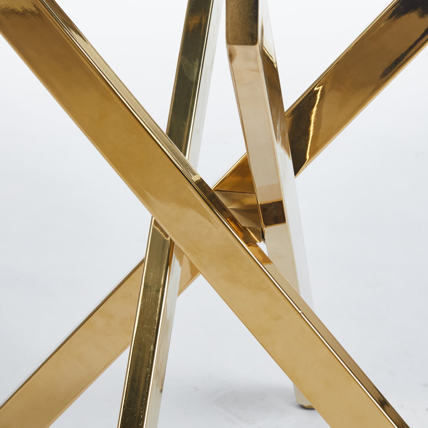 Polished gold Xframe base for a modern coffee table