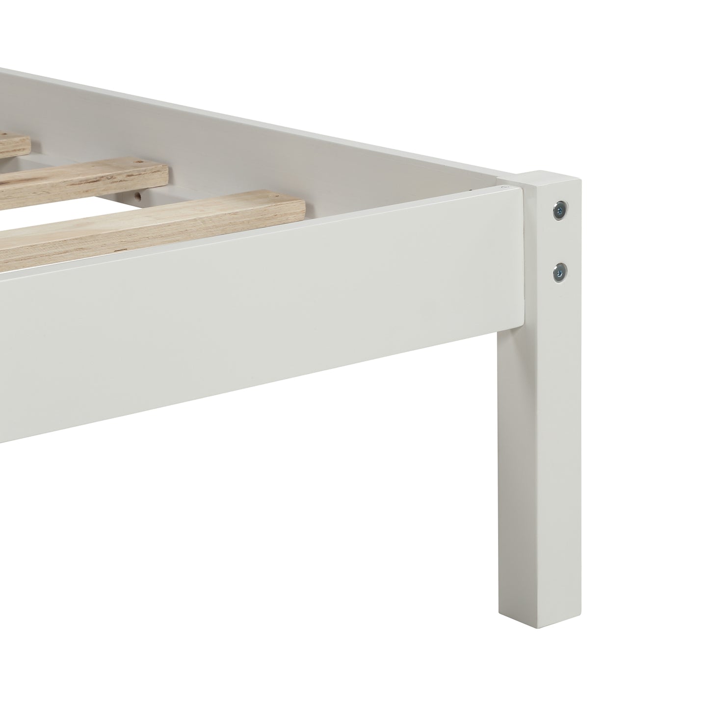 White wooden bed frame corner detail with visible screws