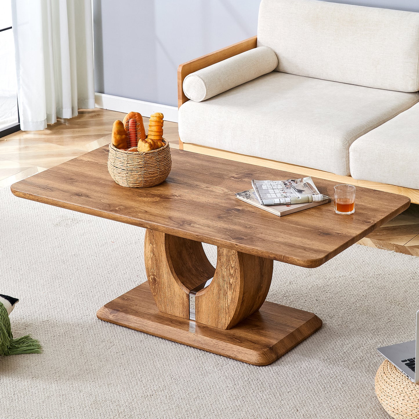 Wooden coffee table with curved base