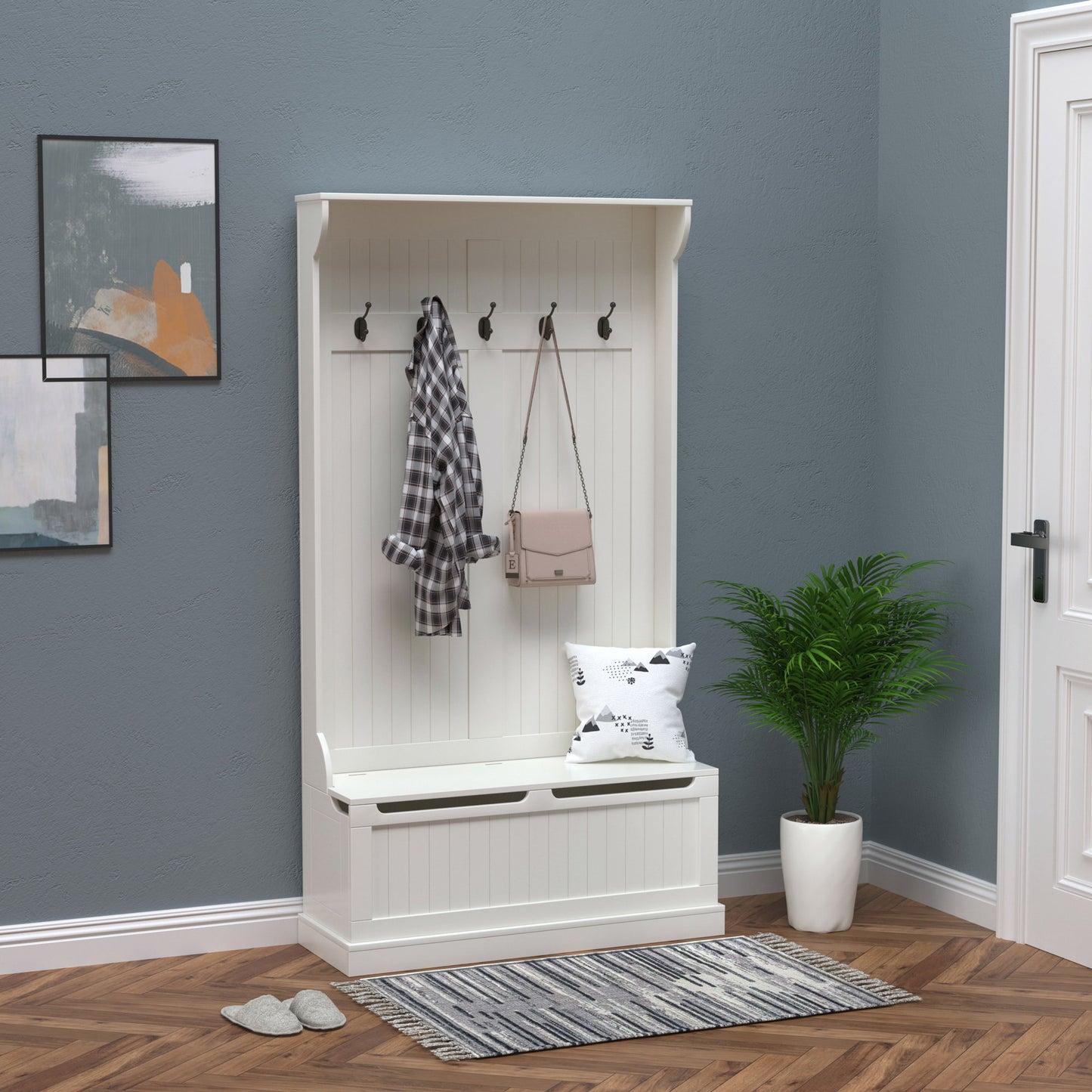 White entryway hall tree with storage bench and coat hooks
