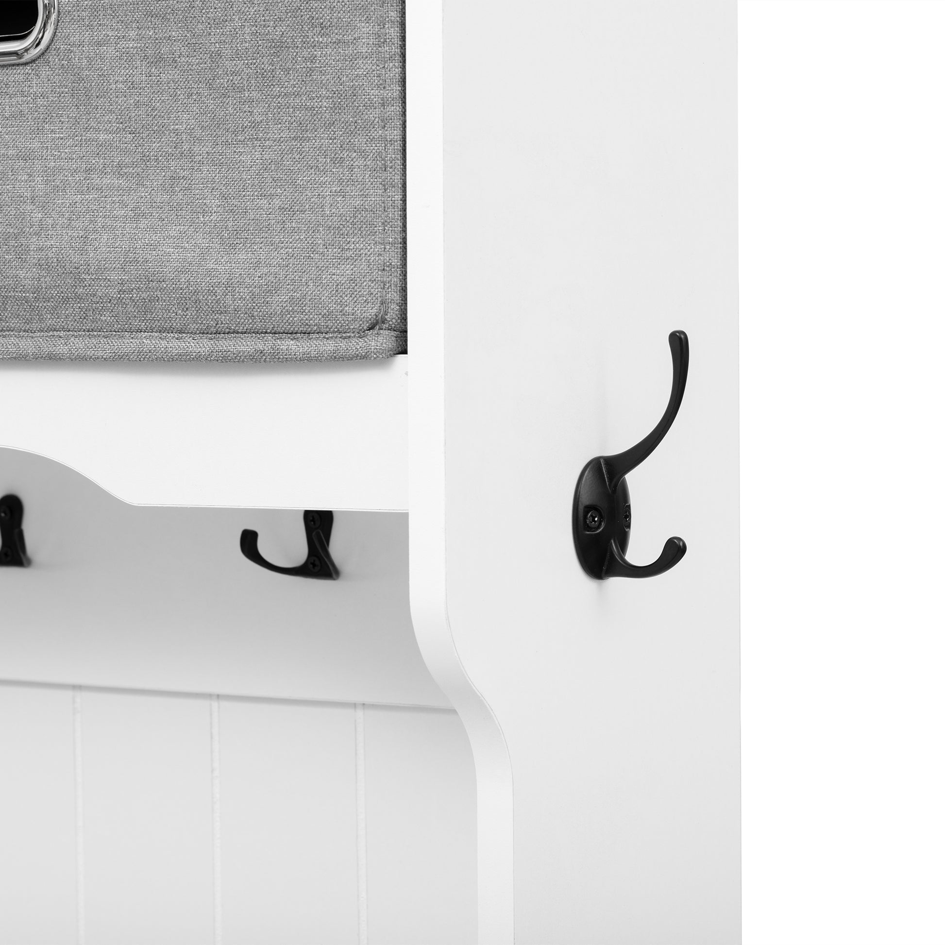 Grey fabric storage bin on white entryway organizer