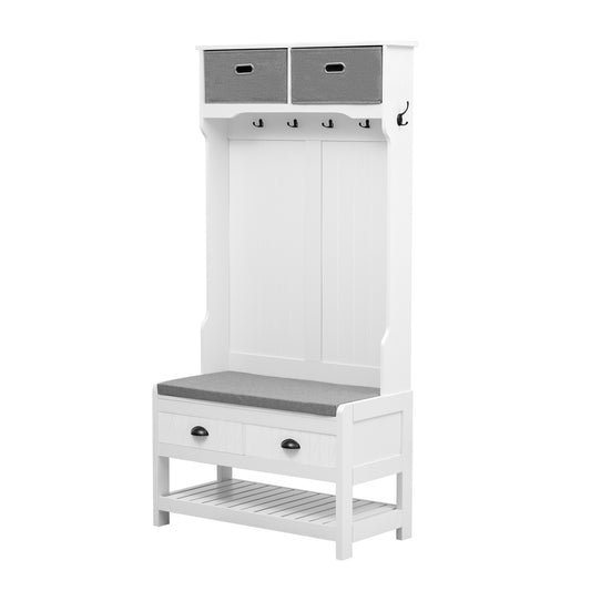 White entryway bench with storage and coat hooks