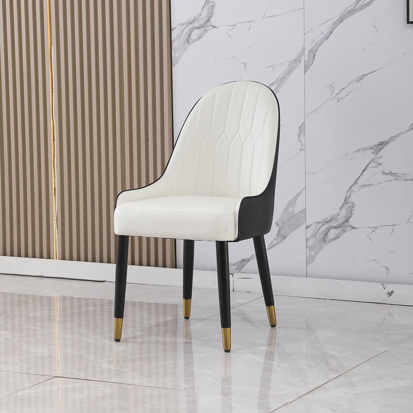 White upholstered dining chair with quilted pattern and black accents