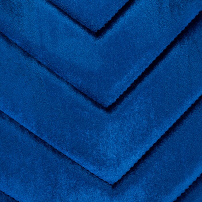 Vibrant blue velvet fabric with chevron stitching