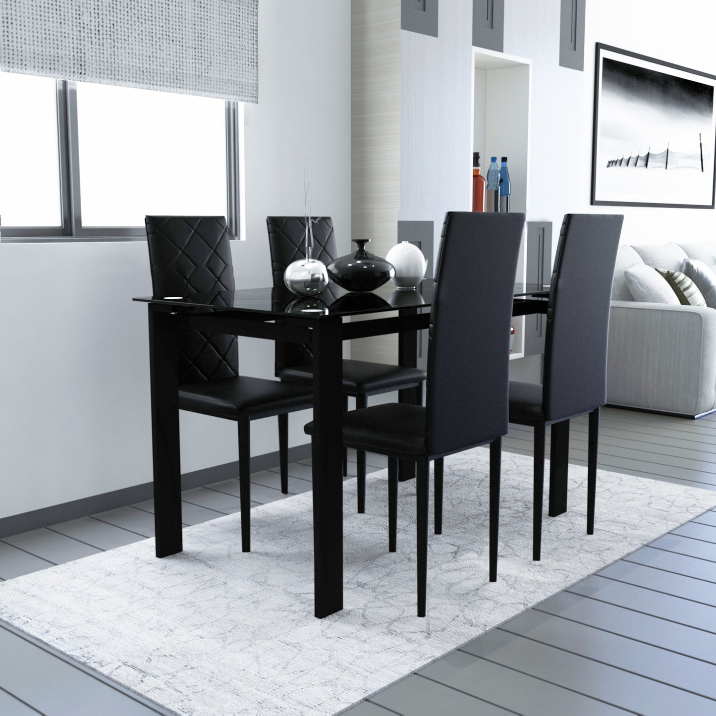 Black glass top dining table with quilted black faux leather chairs