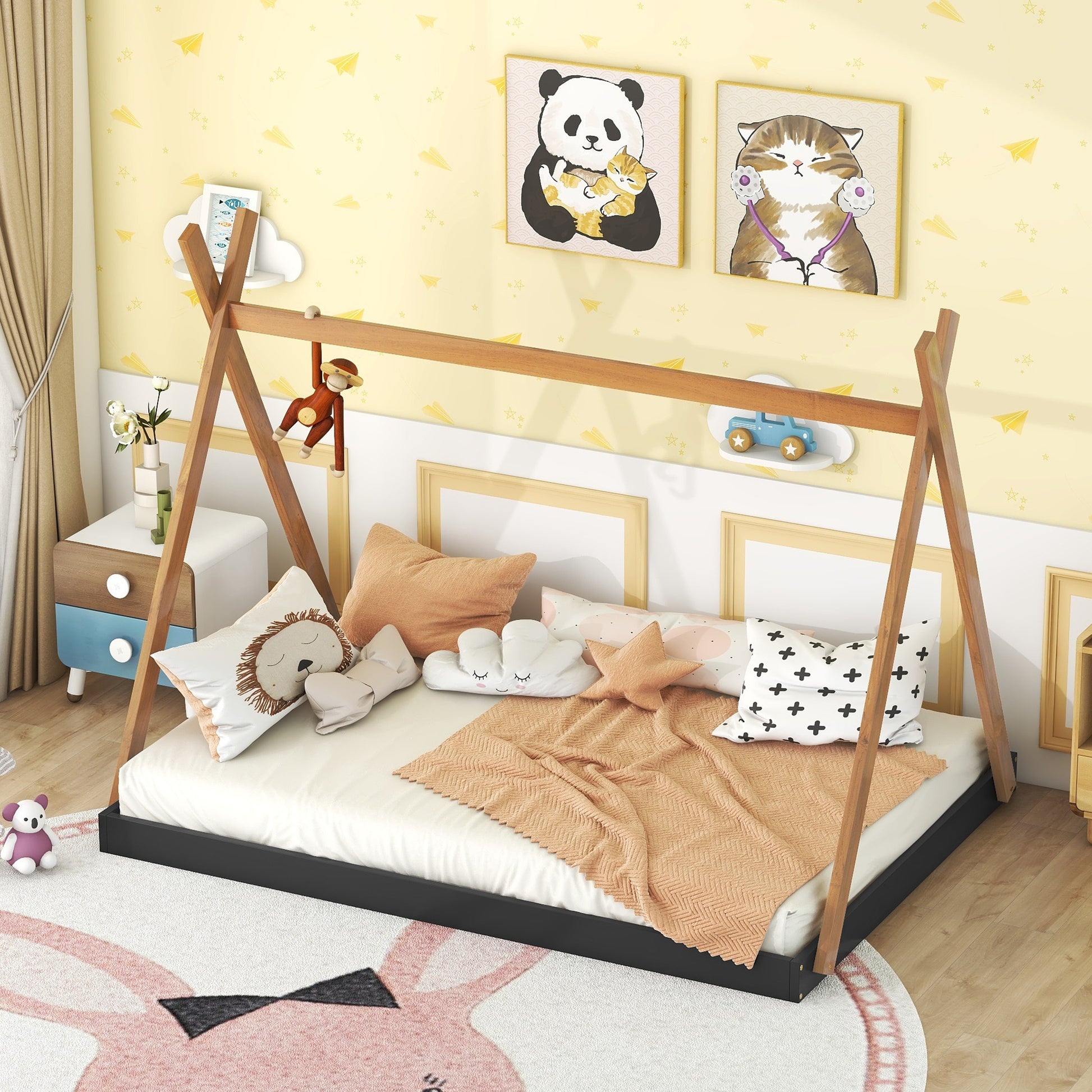 Wooden teepee bed frame with playful pillows and a soft blanket