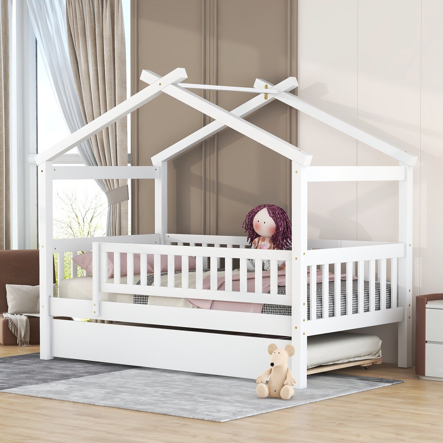 White wooden toddler bed with house frame and trundle
