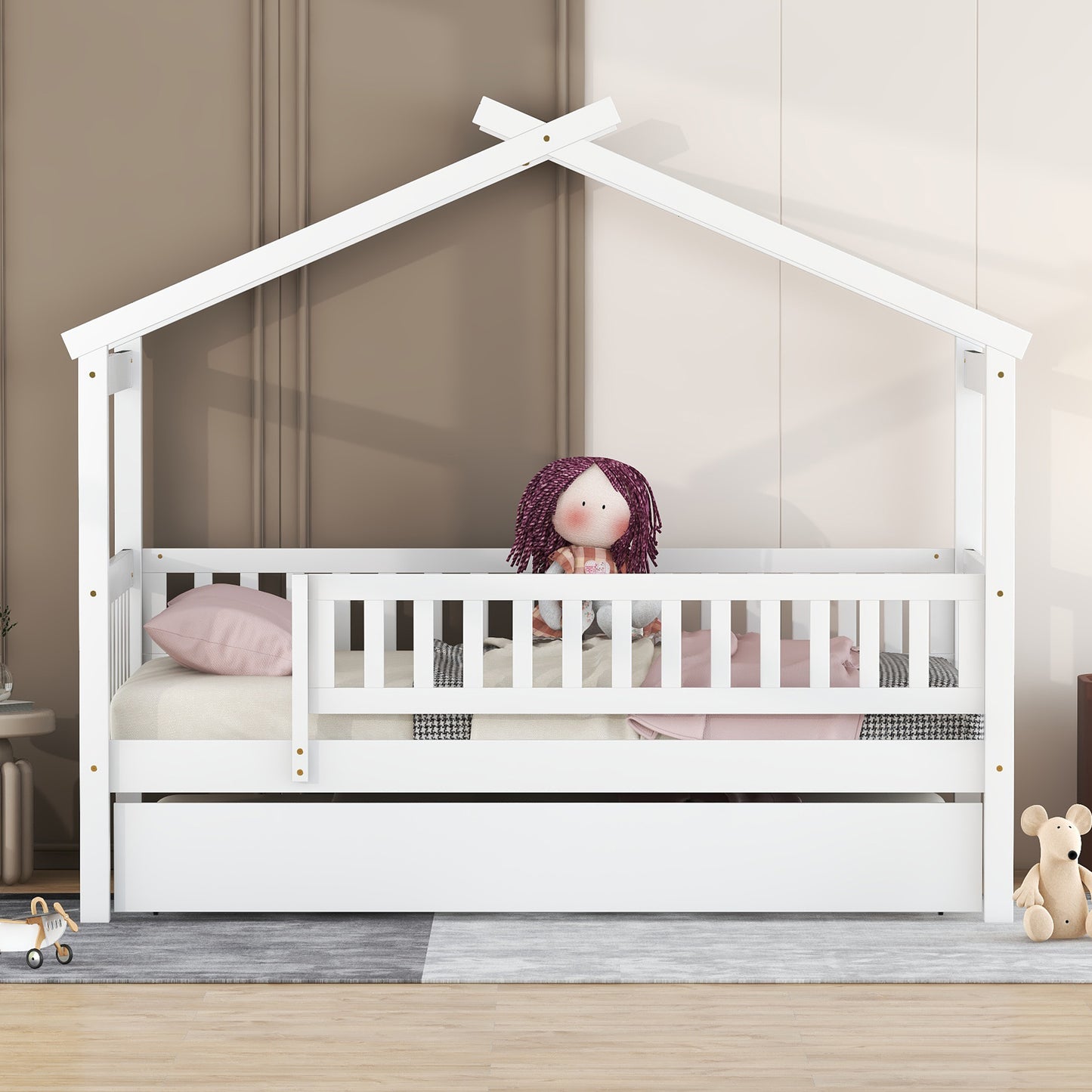 White wooden twin house bed with guardrails and pullout drawer