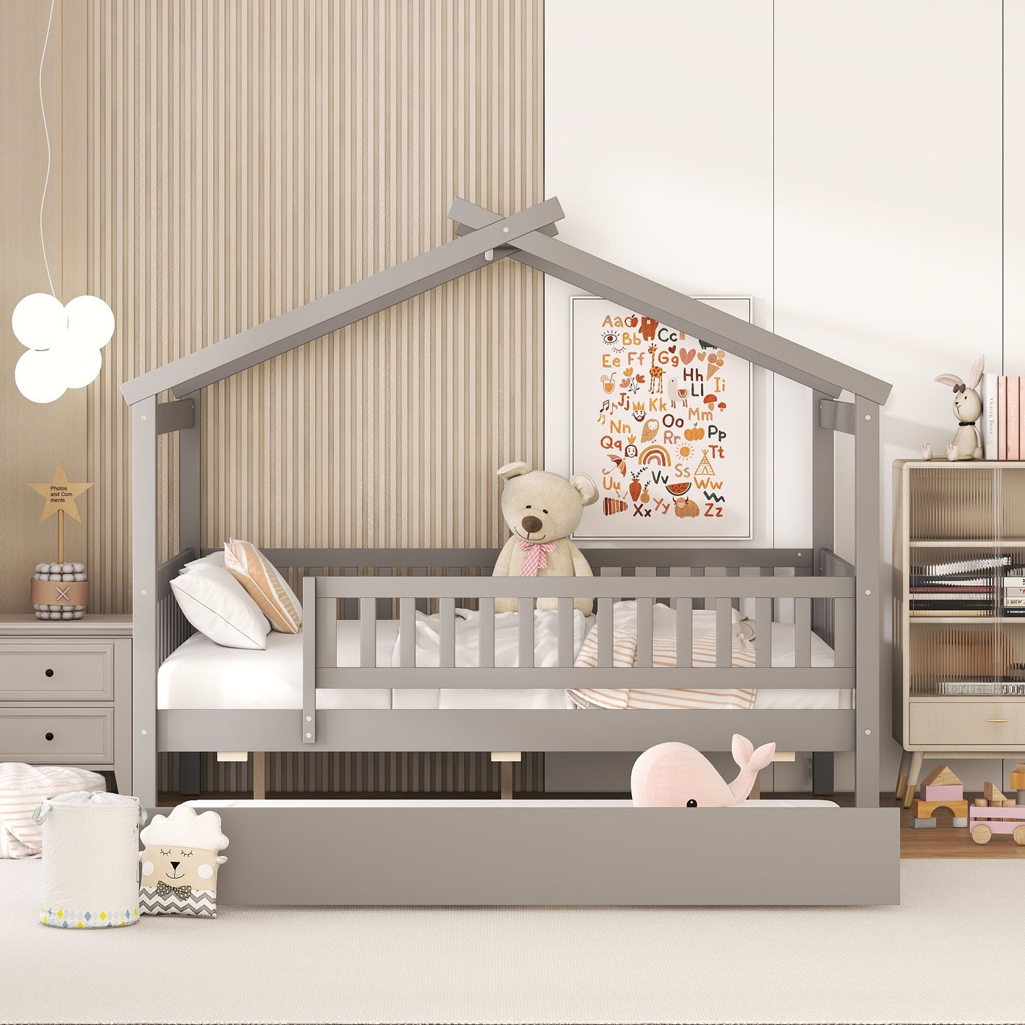 Gray wooden house bed frame for kids with safety rails and a pullout trundle bed