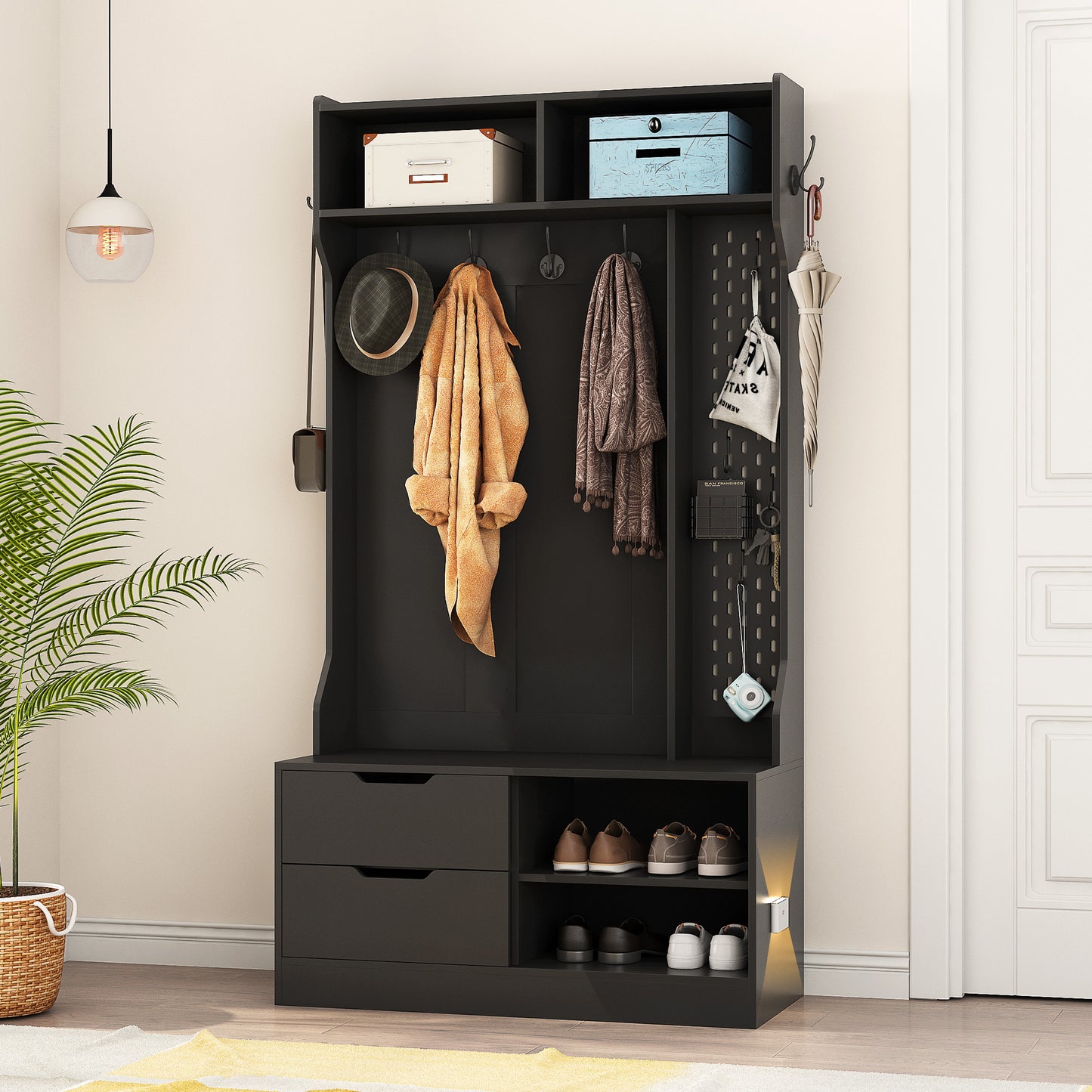 Black entryway organizer with shoe storage coat hooks and drawers for organized hall