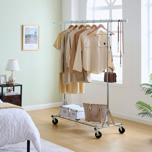 Silver rolling garment rack with assorted neutralcolored shirts and tan handbag