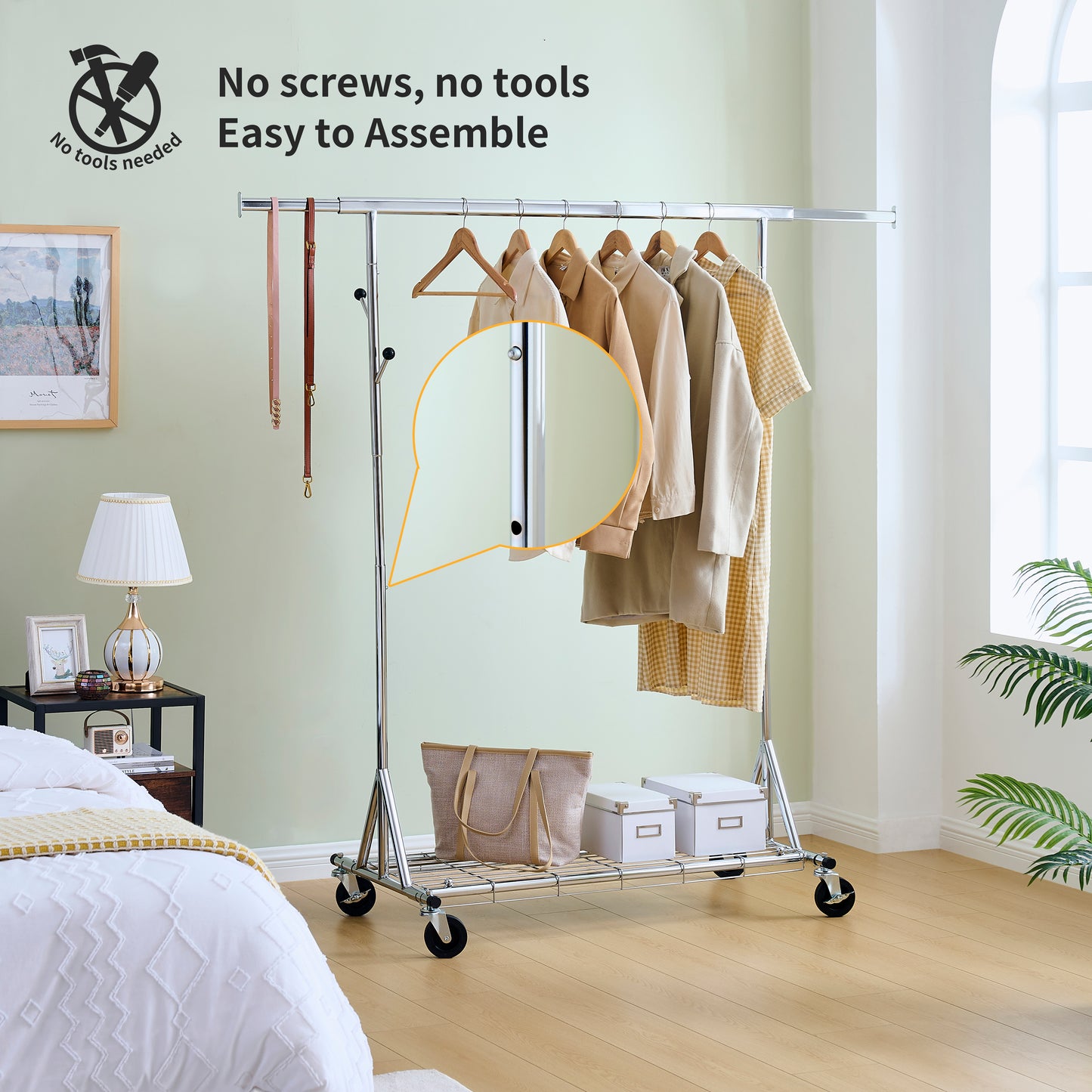 Rolling garment rack with chrome finish and wooden hangers holding shirts