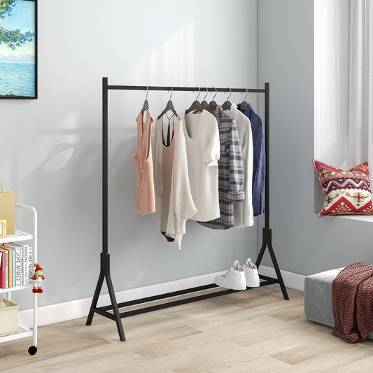 Black metal garment rack displaying a pastel pink vest beige knit cardigan white tshirt and plaid shirt