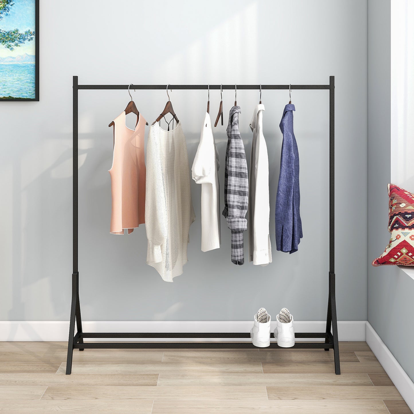 Peach sleeveless top on black garment rack