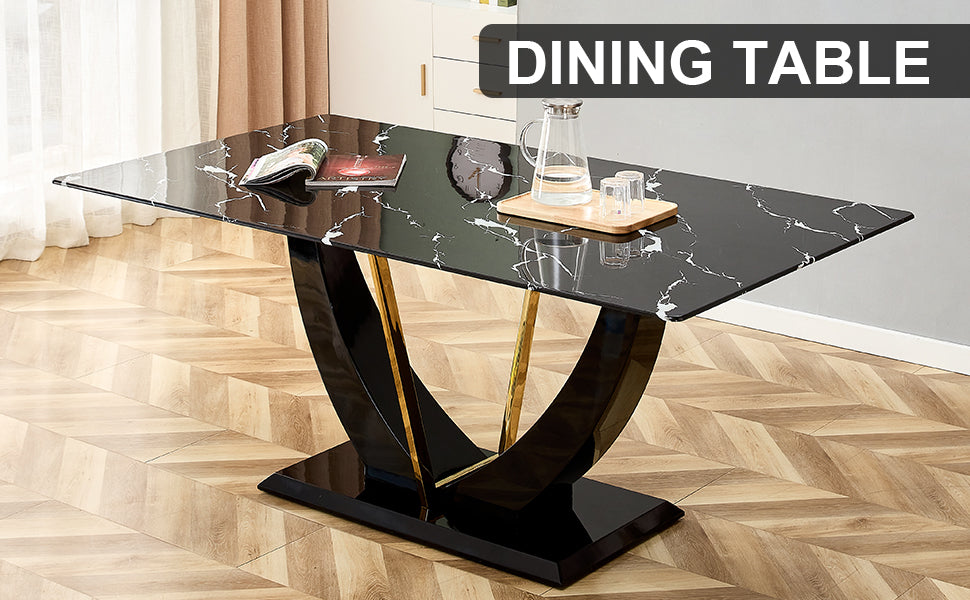 Sleek black marble dining table with Ushaped black legs and gold accents