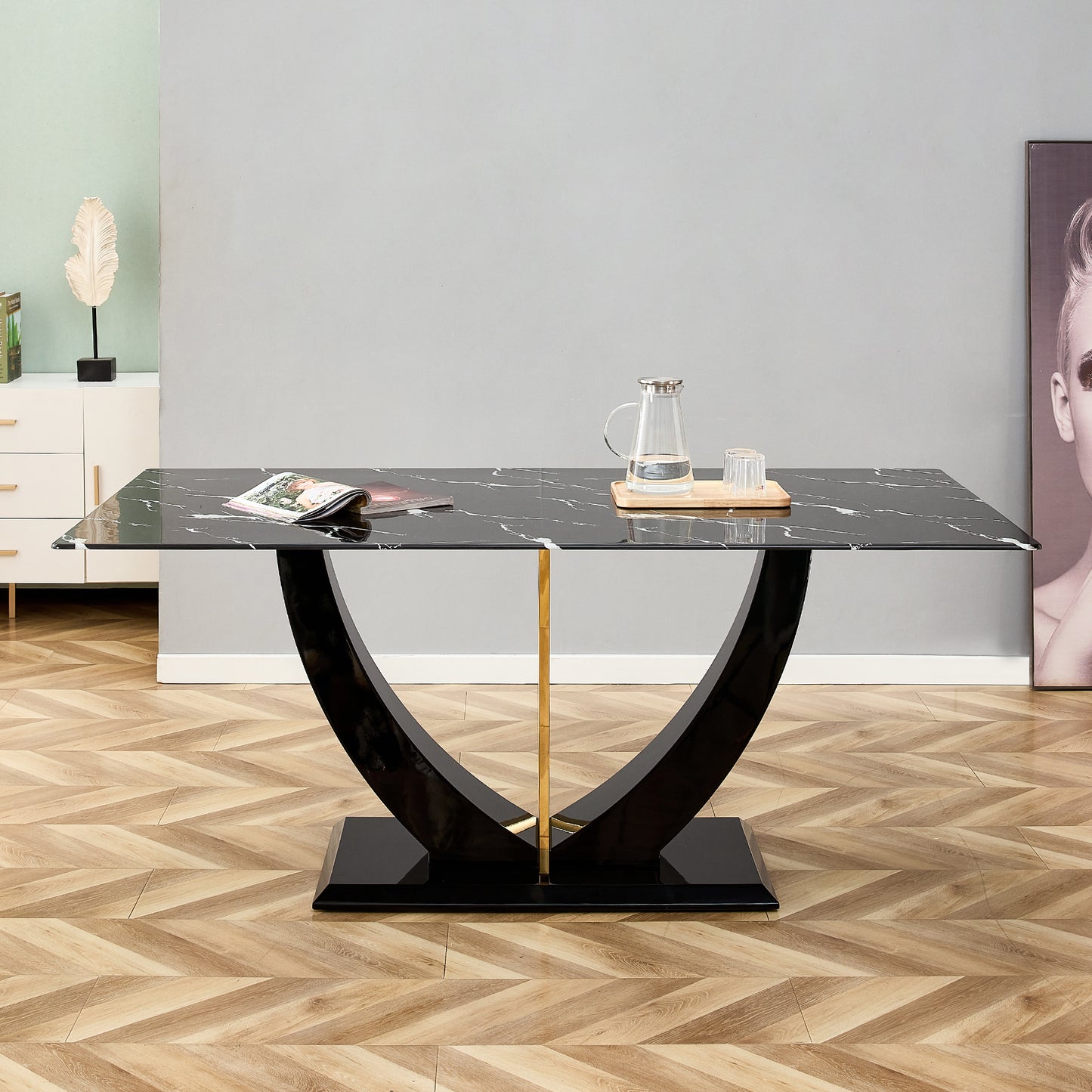 Black marble dining table with curved highgloss base and gold accent