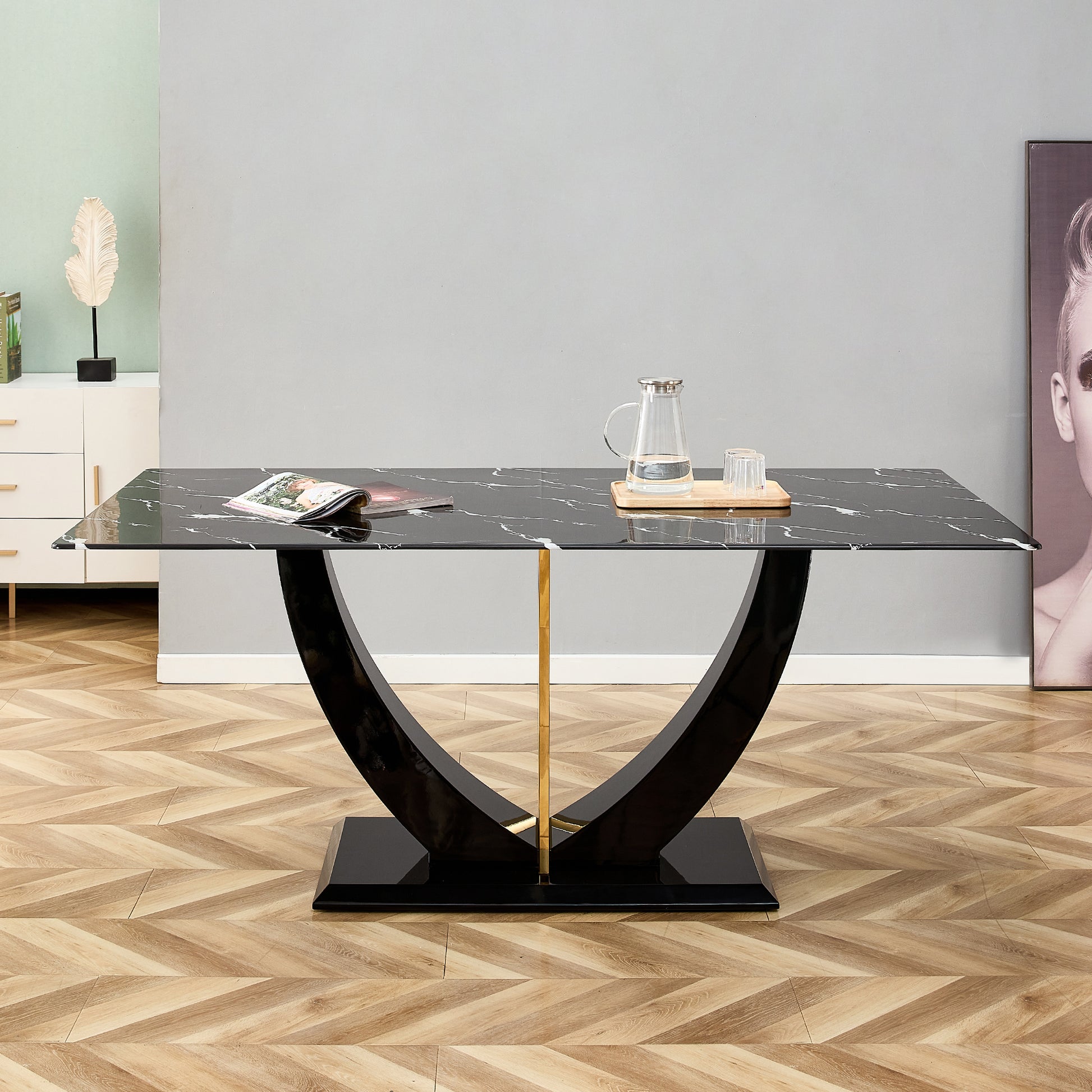 Black marble dining table with curved highgloss base and gold accent