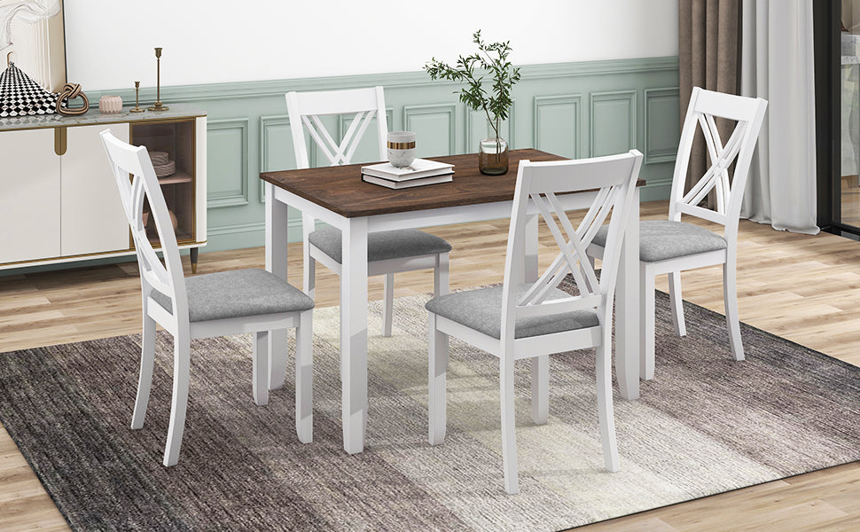 White wooden dining table set with four crossback chairs and grey upholstered seats
