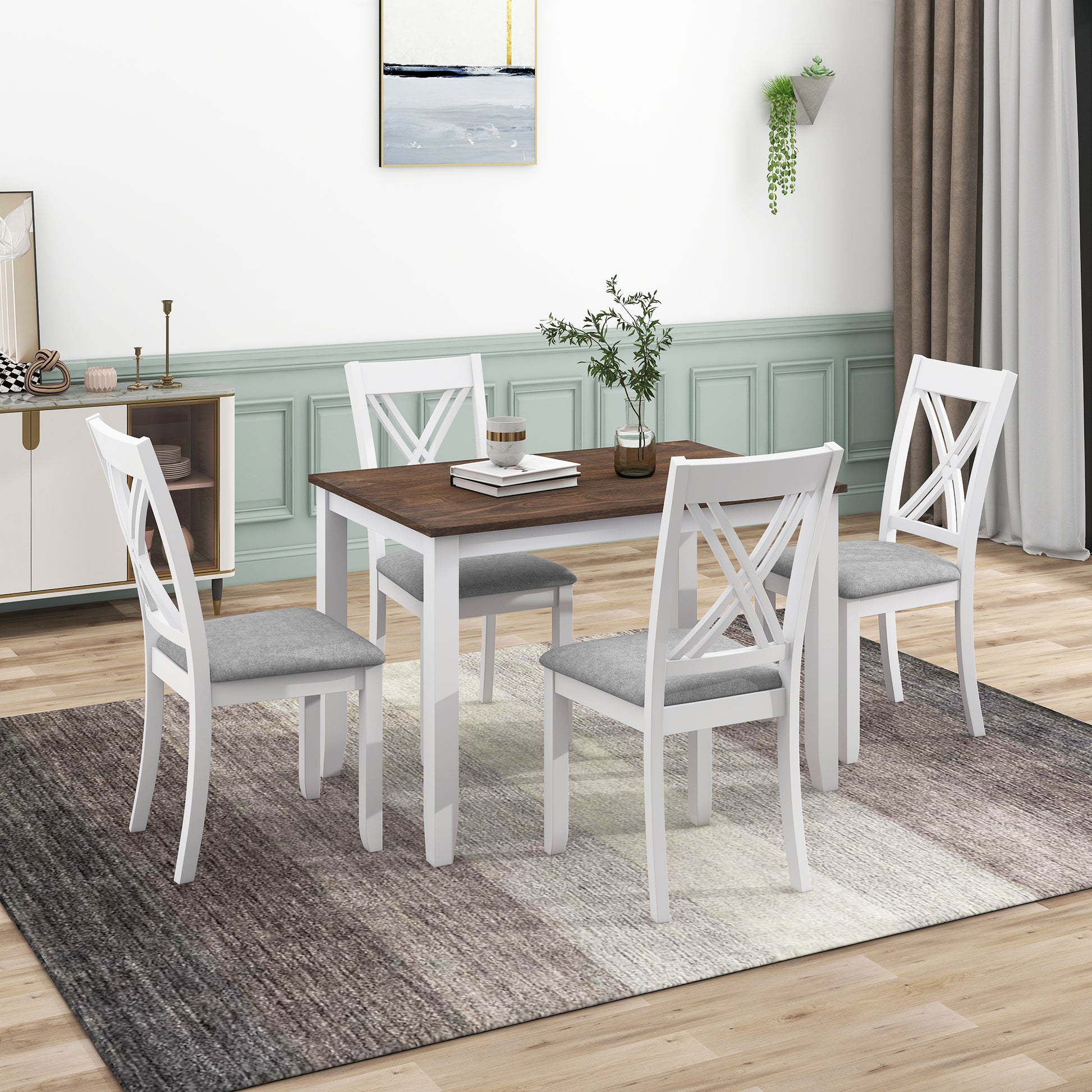 White wood dining chairs with grey upholstered seats around a dark wood table