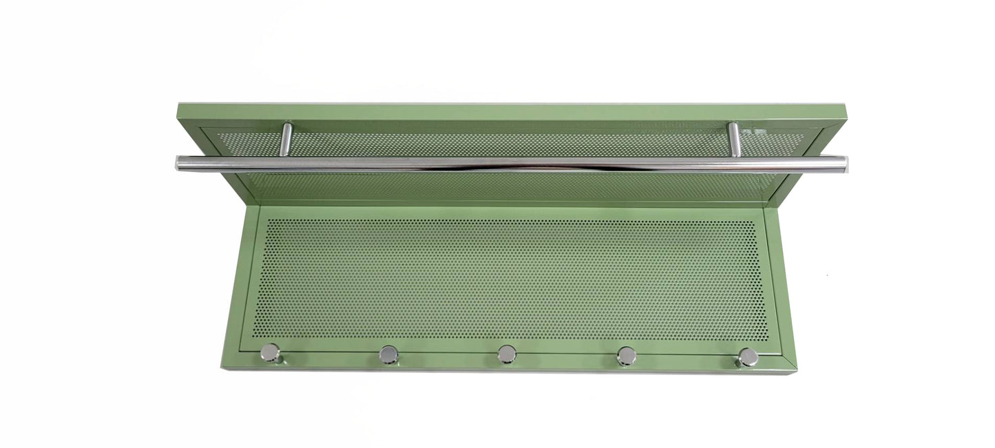 Sage green metal range hood with perforated front panel and chrome bar