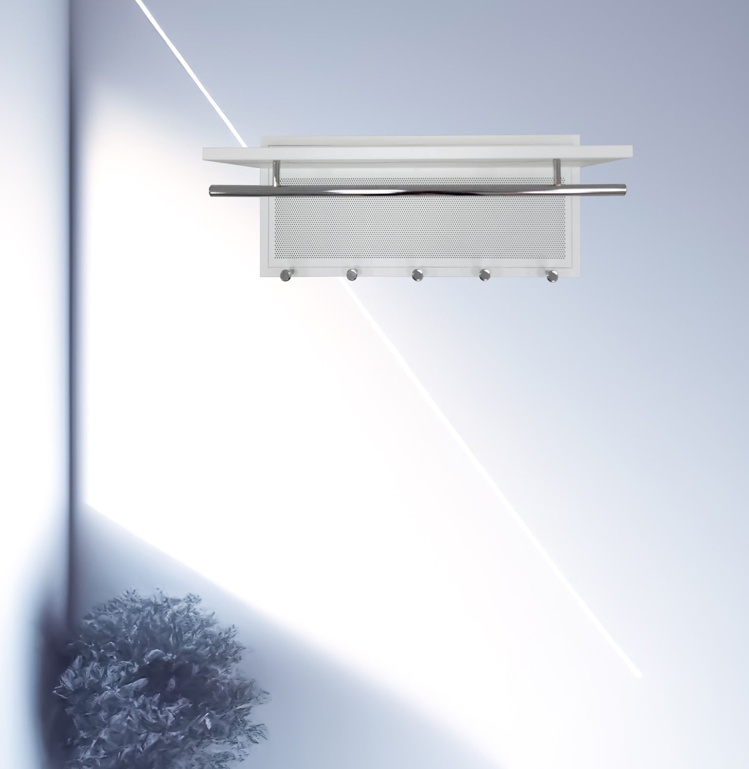 White entryway shelf with coat hooks and brushed metal rod