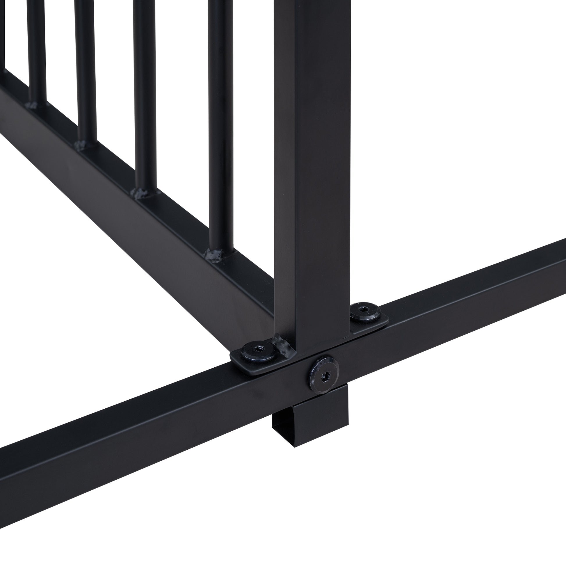 Black metal fence panel corner with visible bolts