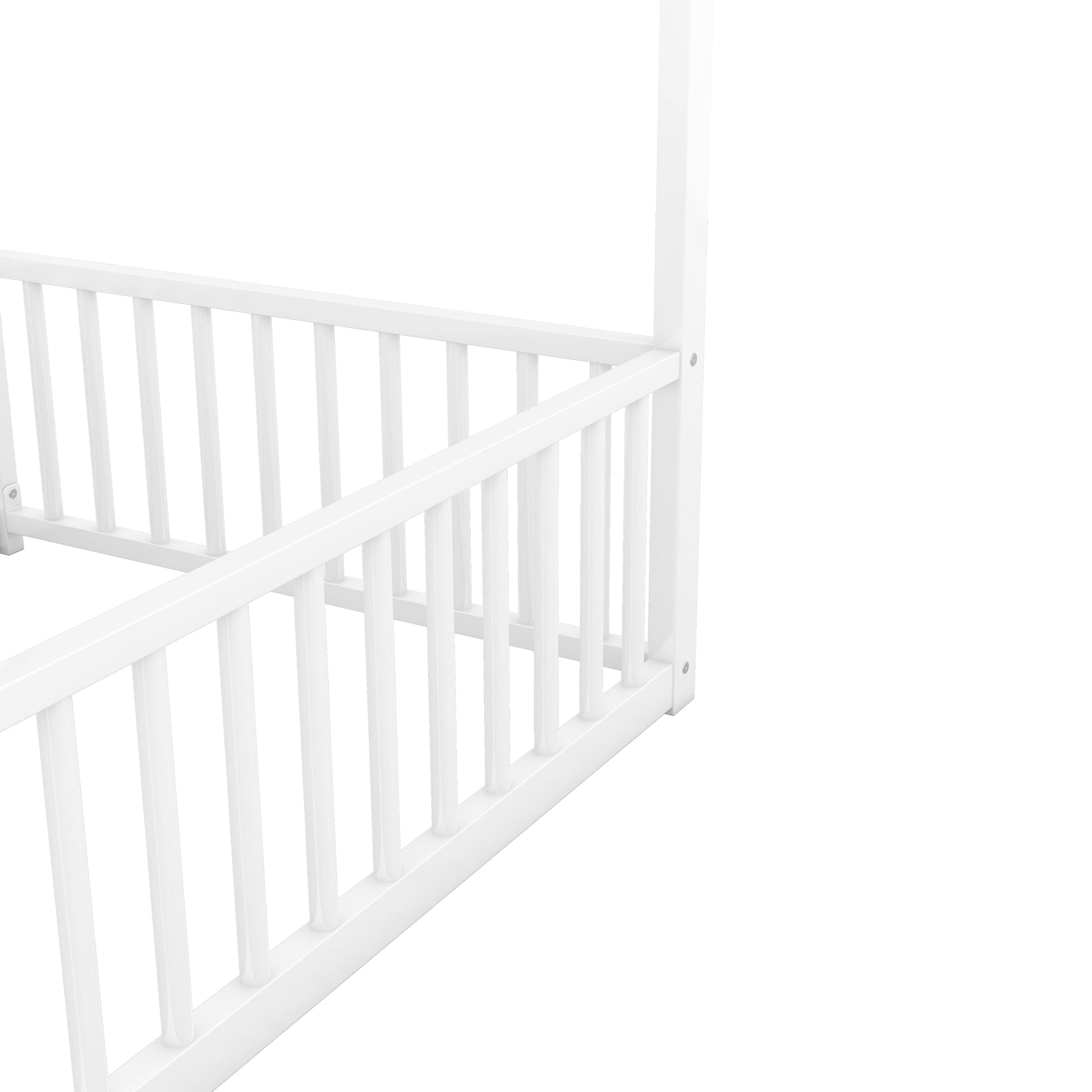 White wooden crib railing detail with vertical spindles