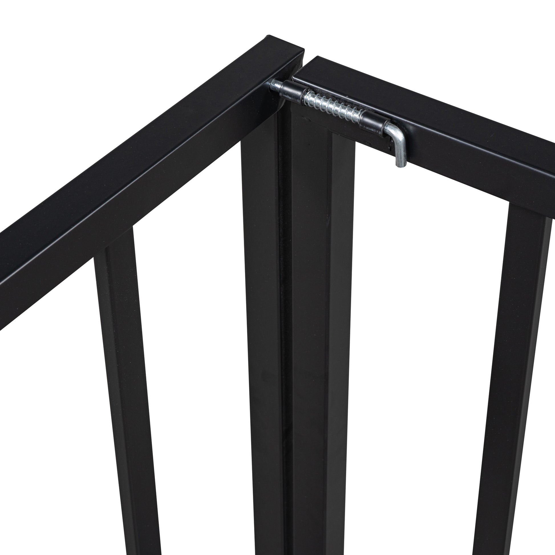 Black metal gate hinge detail with spring and pin