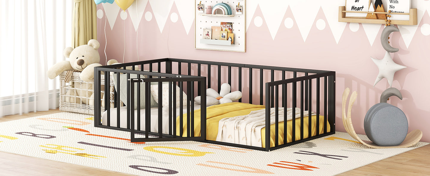 Black metal toddler bed frame with open gate and yellow bedding