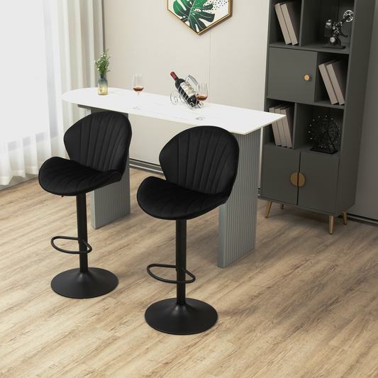 Plush black velvet bar stool with adjustable height and footrest