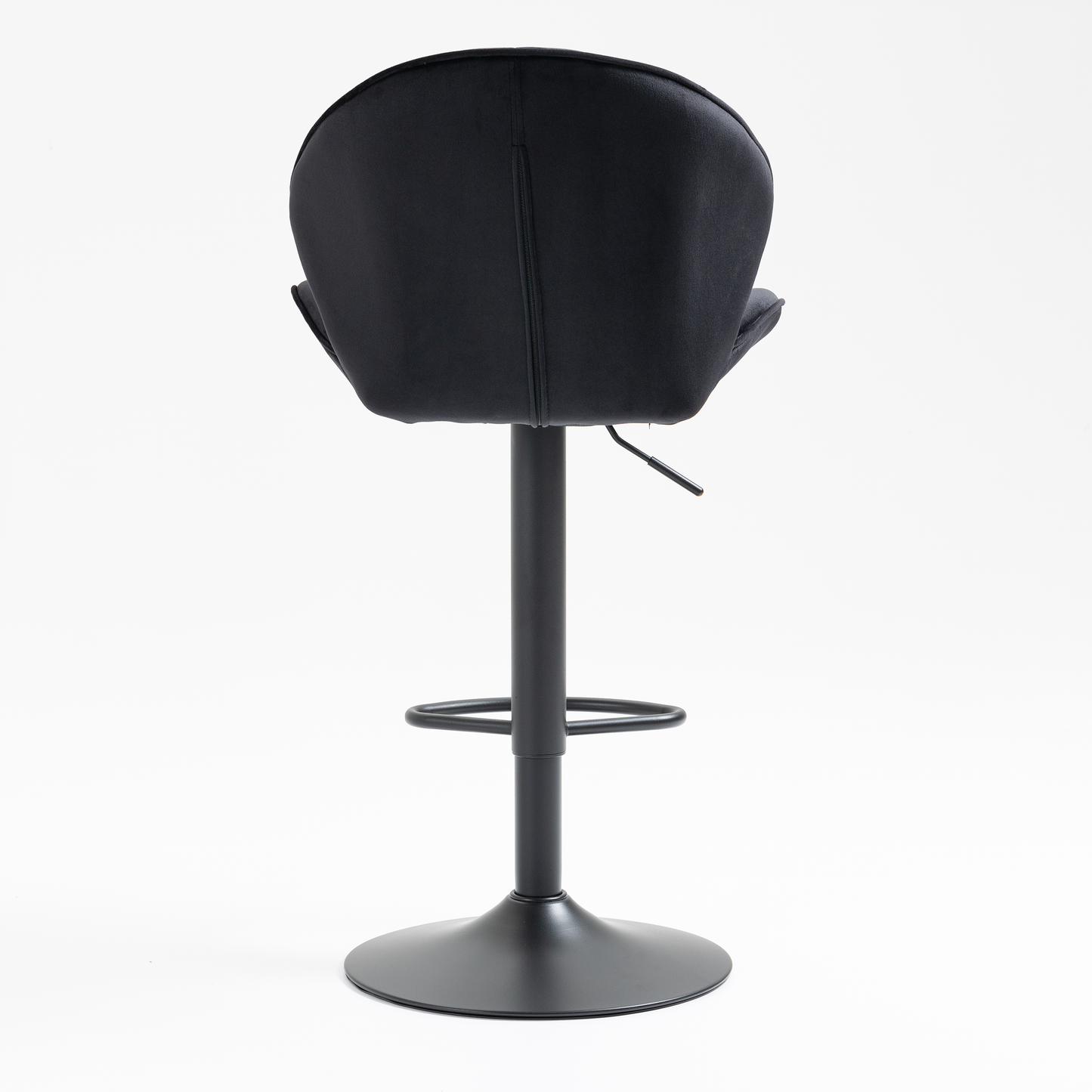 Black velvet bar stool with adjustable height and footrest