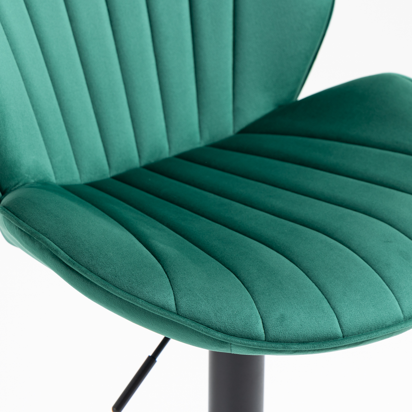 Emerald green velvet accent chair with channel tufting