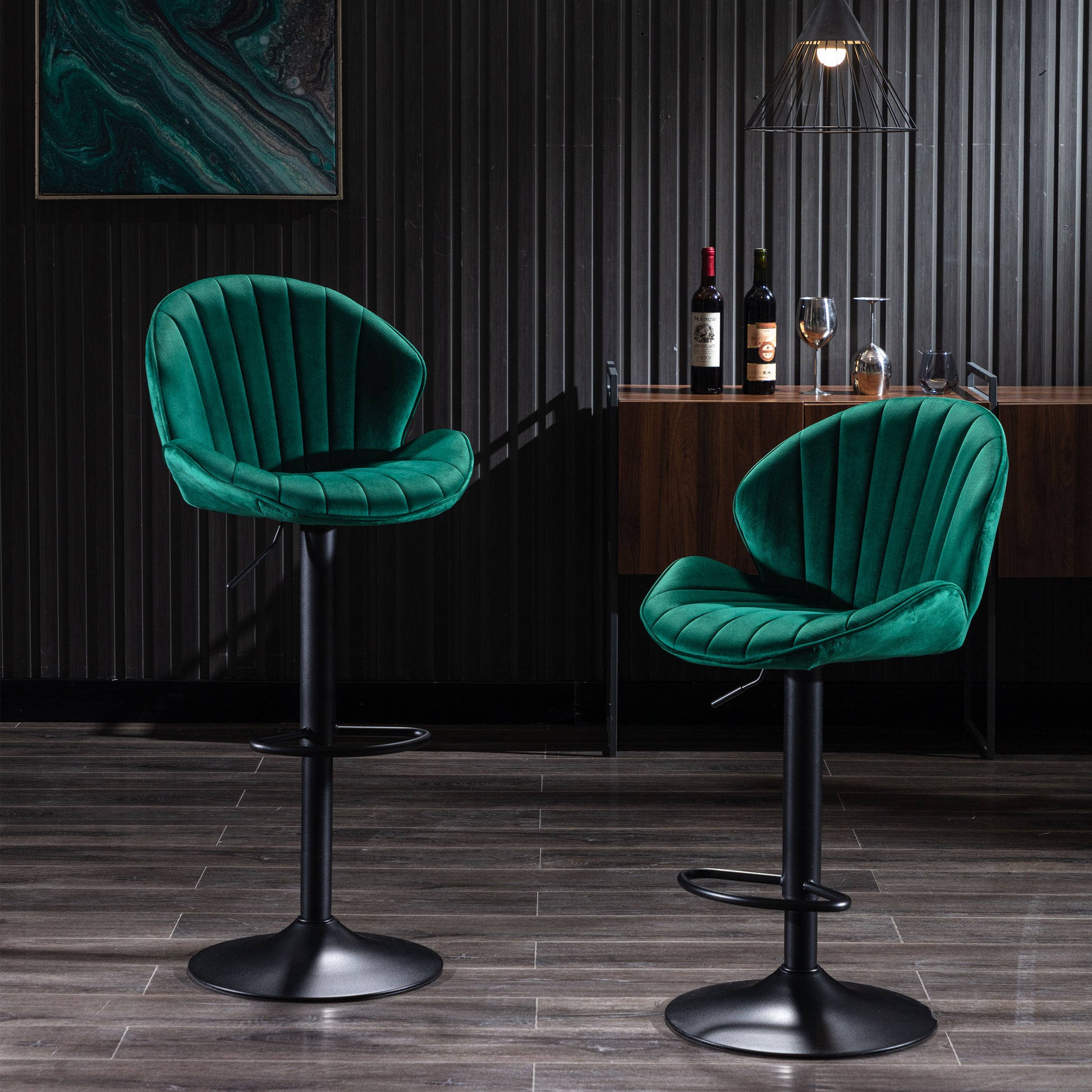 Plush emerald velvet bar stool with adjustable height and black base