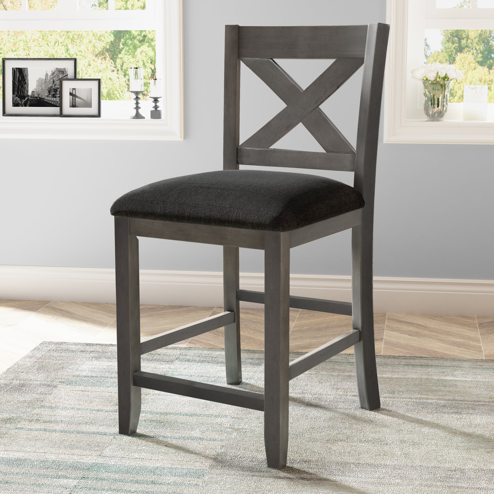 Gray wooden bar stool with dark fabric seat and Xback design