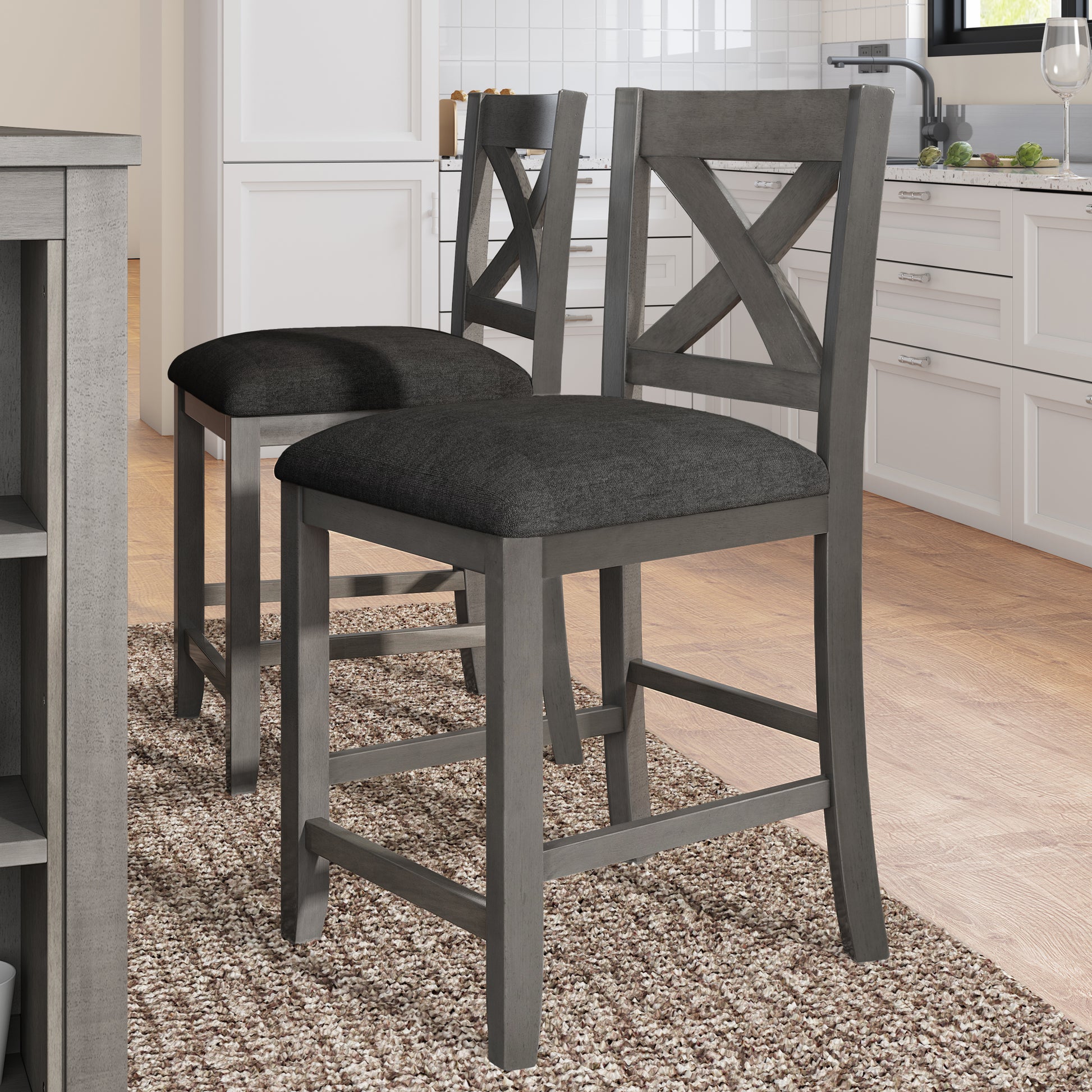 Gray wooden bar stool with dark upholstered seat and Xback detail