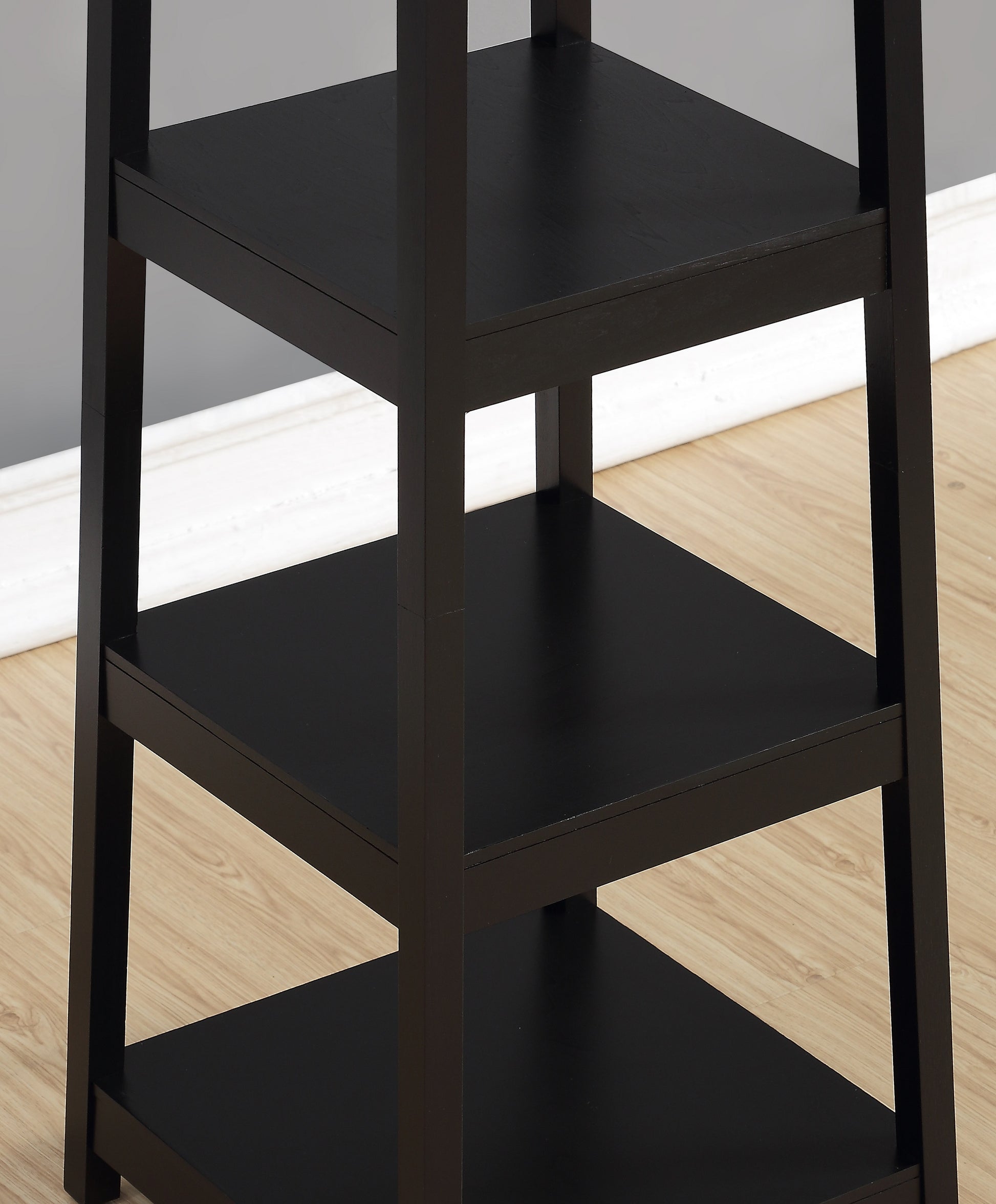 Black modern ladder shelf with three open shelves