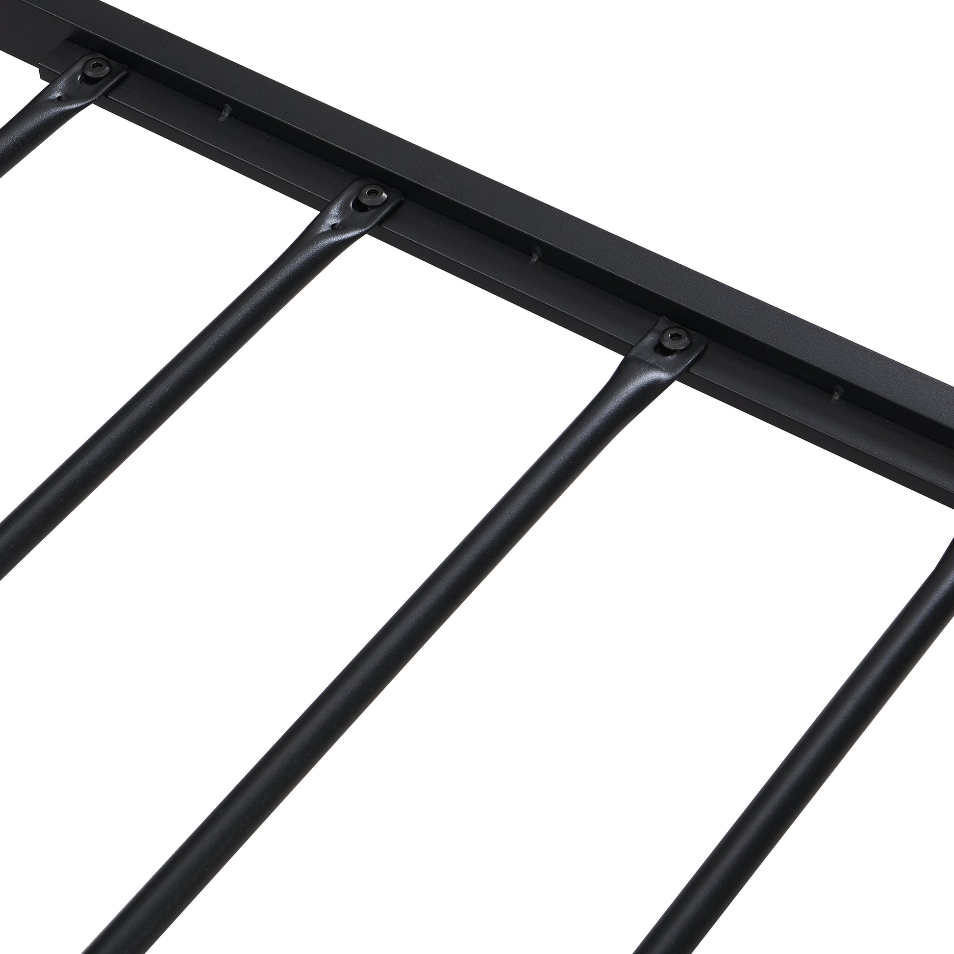 Closeup of black metal bed frame slats