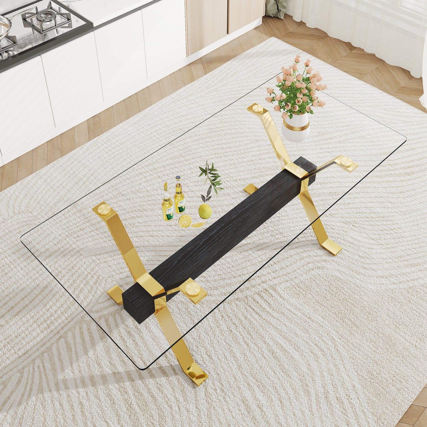 Modern glass coffee table with gold metal legs and dark wood accent