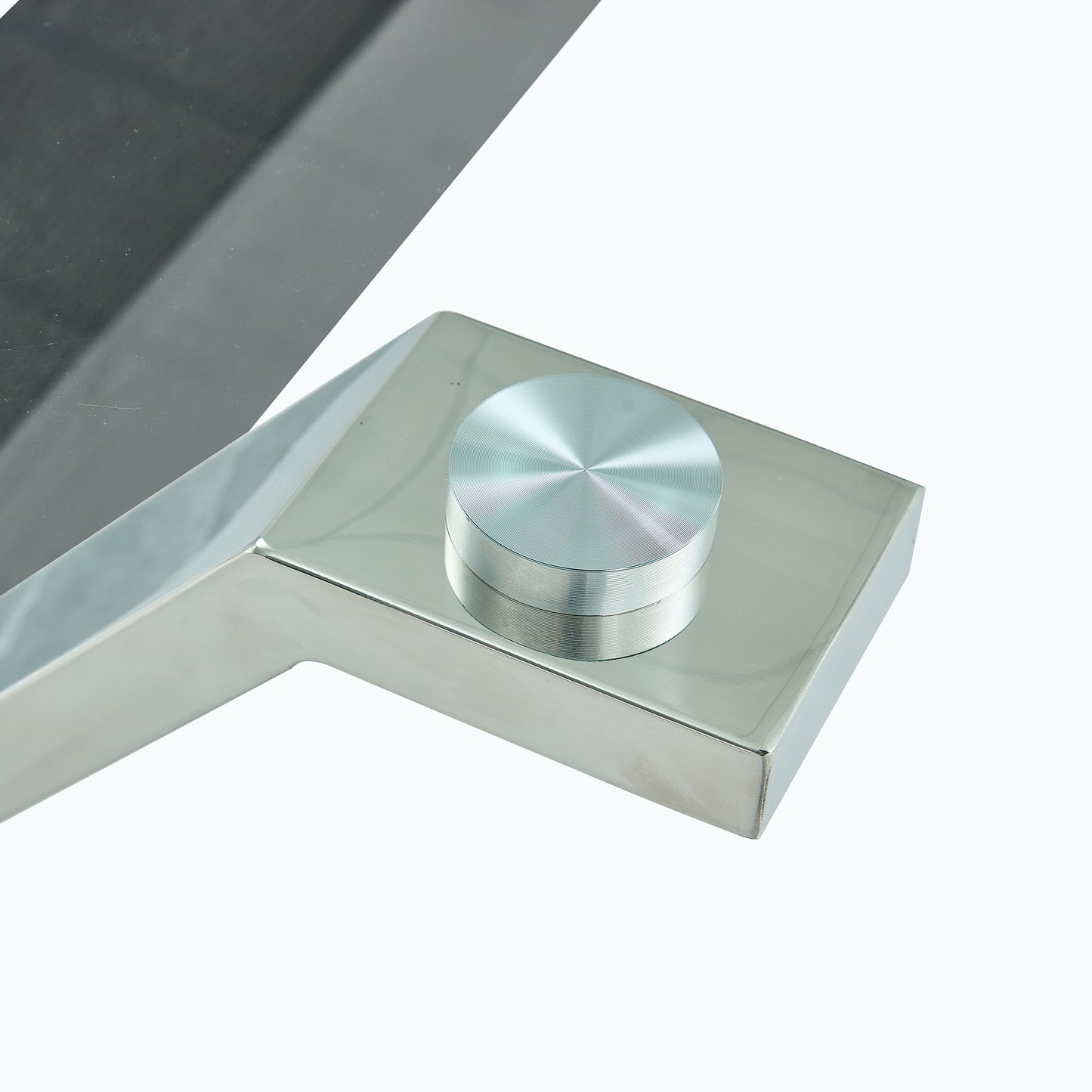 Brushed metal faucet knob with concentric circles