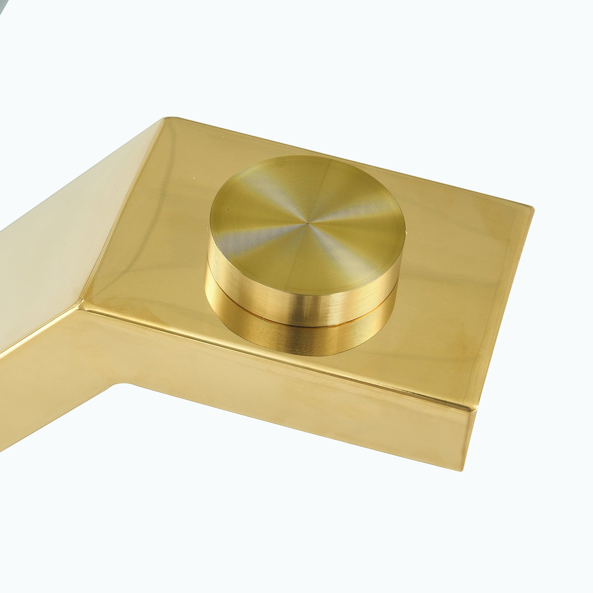 Polished brass modern faucet handle with concentric ring detail