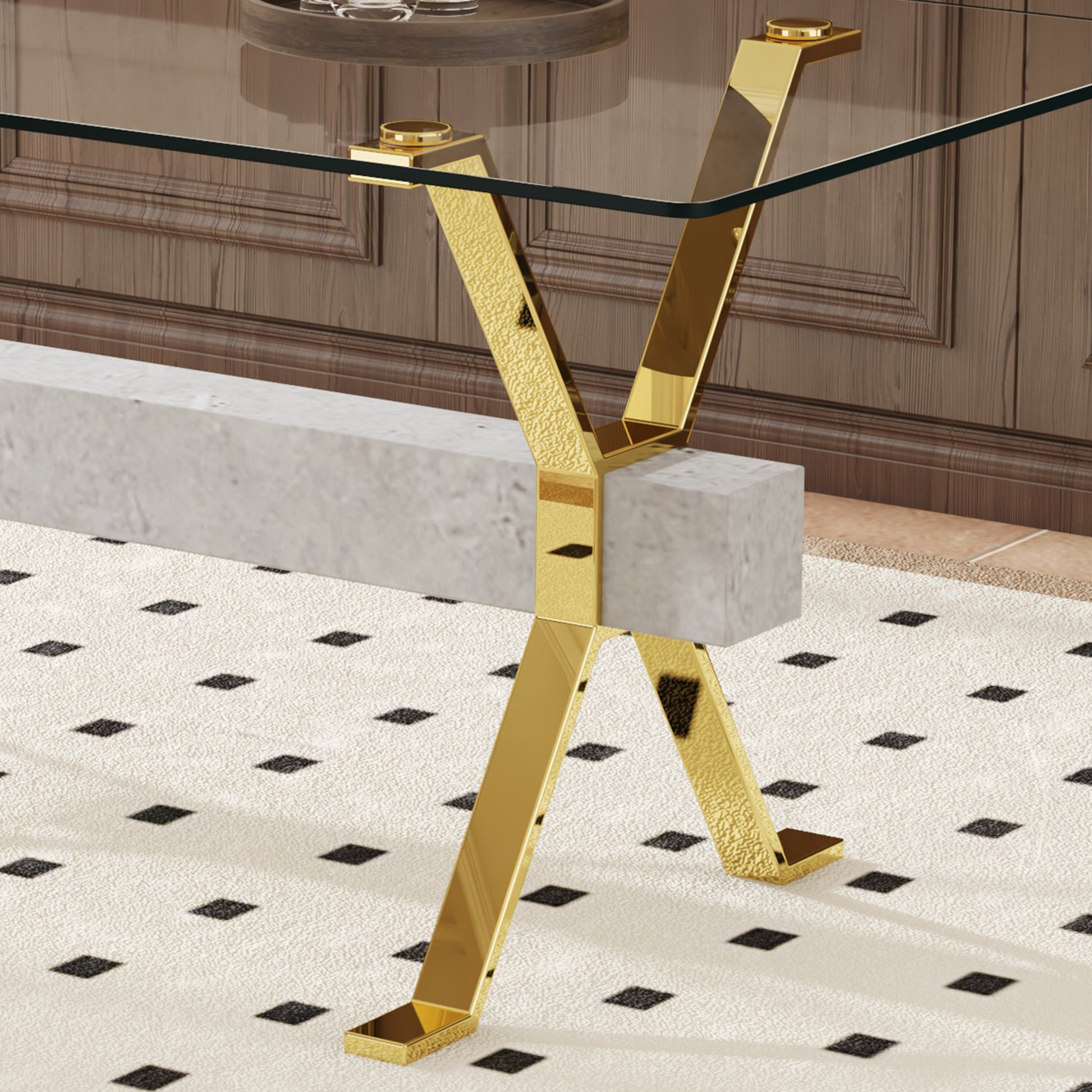 Gold metal Xframe legs on a modern glass coffee table