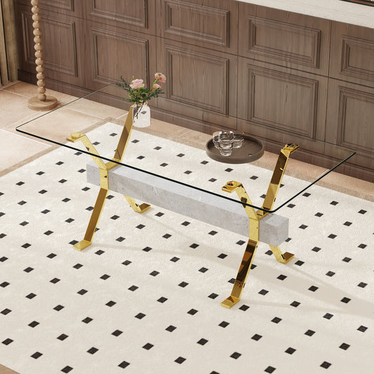 Modern glass coffee table with polished gold legs and marble base