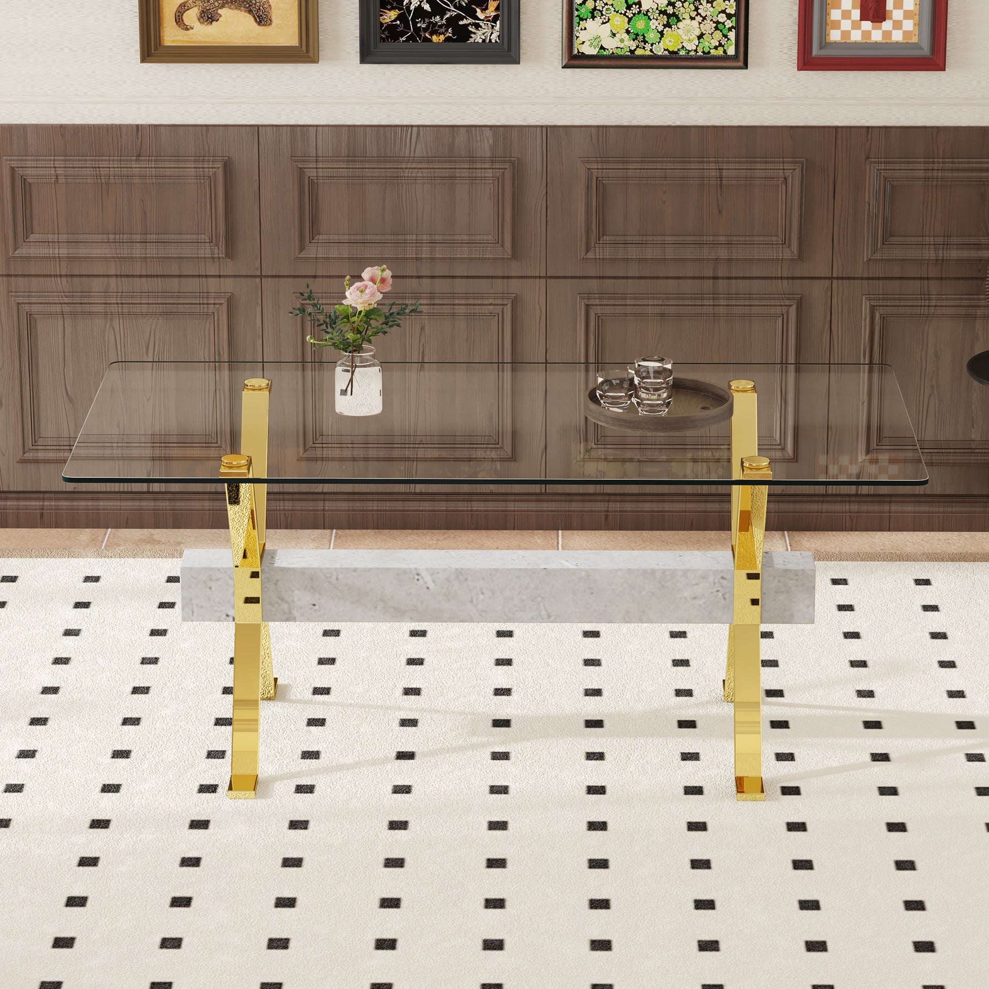 Modern glass coffee table with polished gold legs and white marble accents