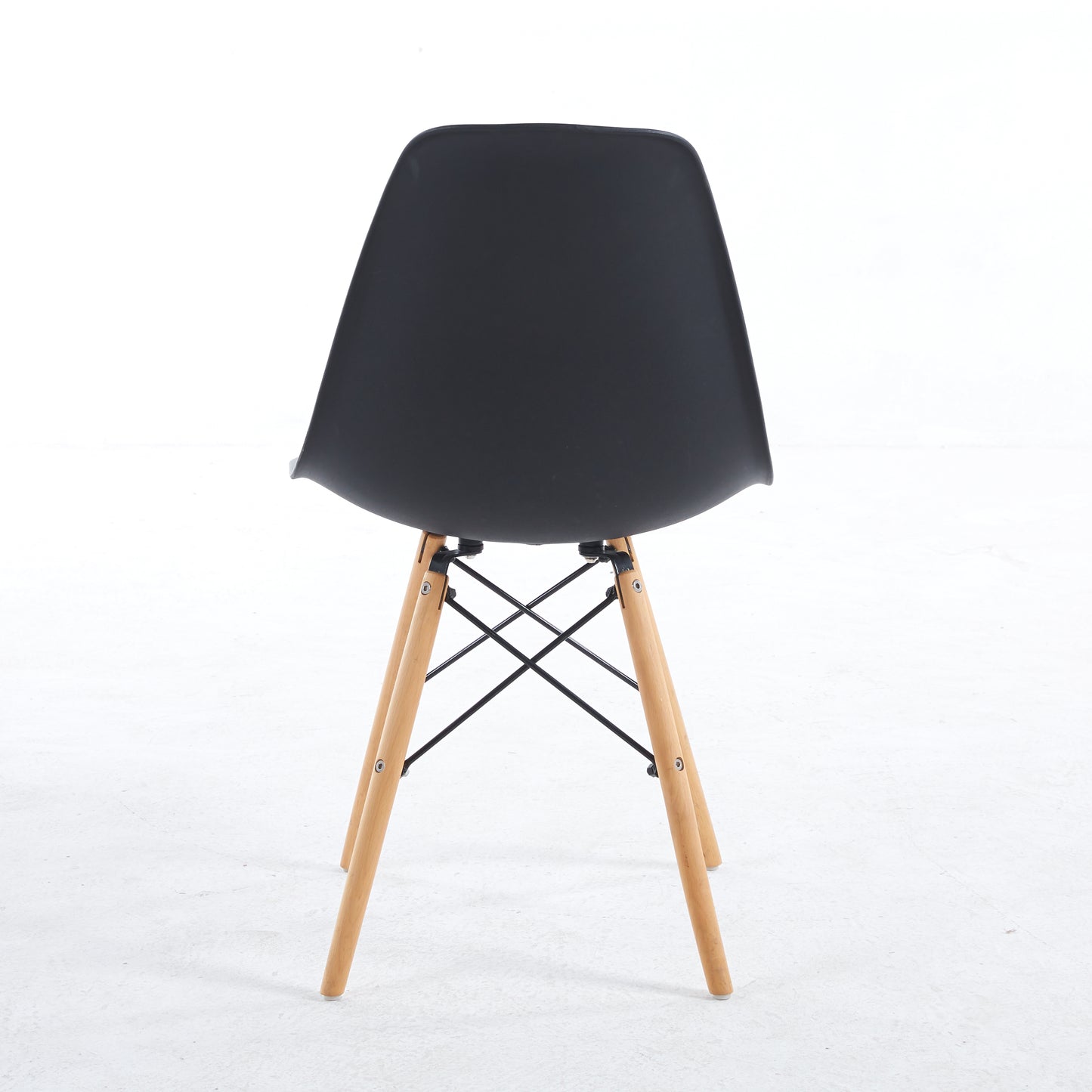 Black plastic modern dining chair with beech wood legs