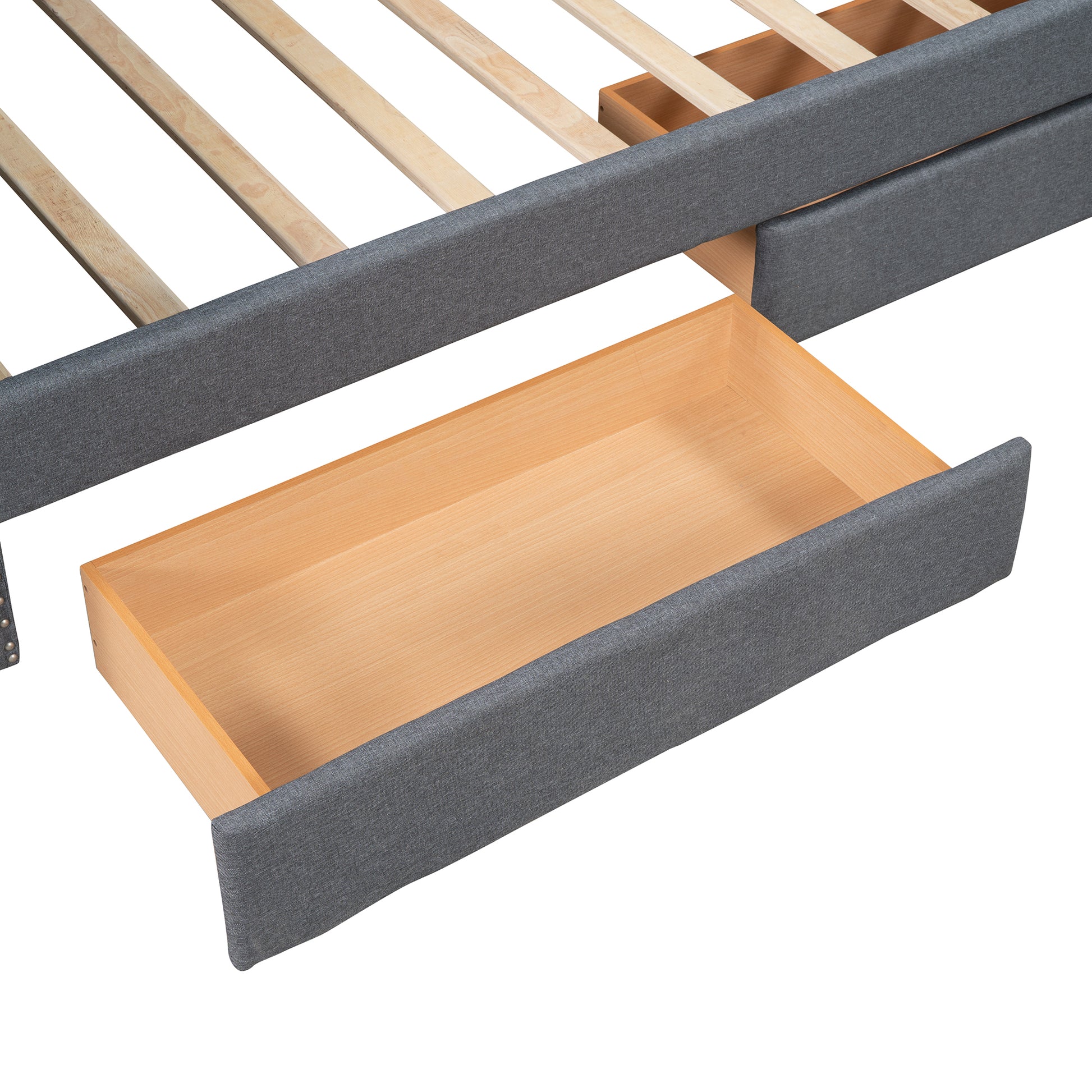 Grey upholstered bed frame with open wooden storage drawer and slats