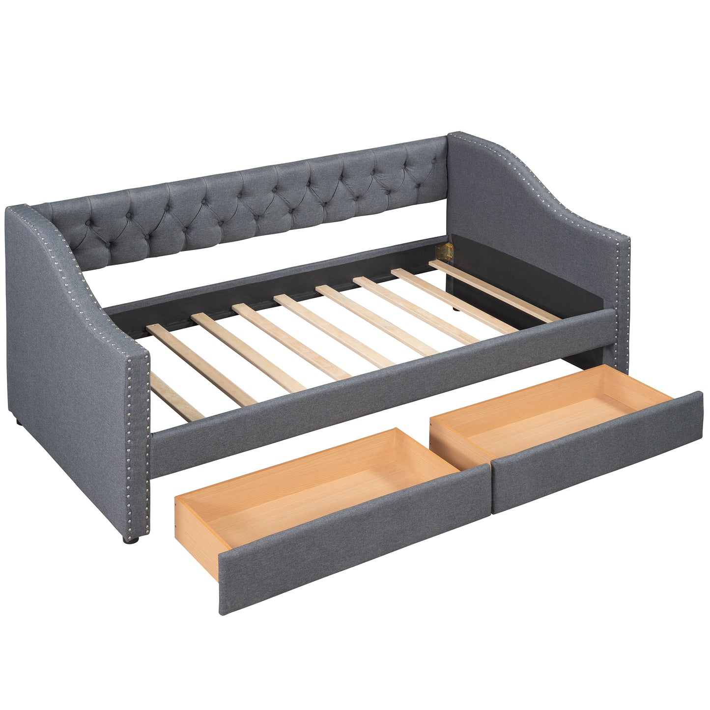 Dark grey tufted daybed with ornate nailhead trim and two pullout storage drawers