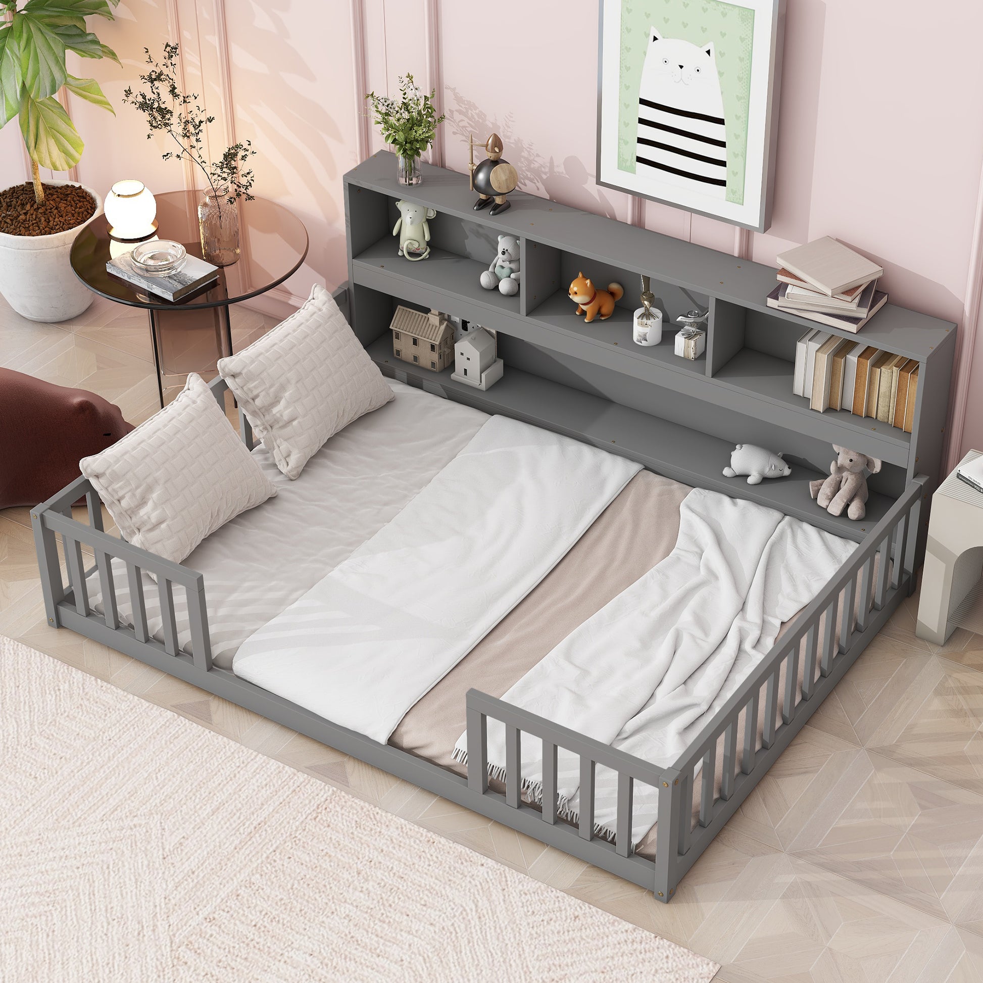 Gray toddler bed with guardrails and integrated bookshelf perfect for nursery