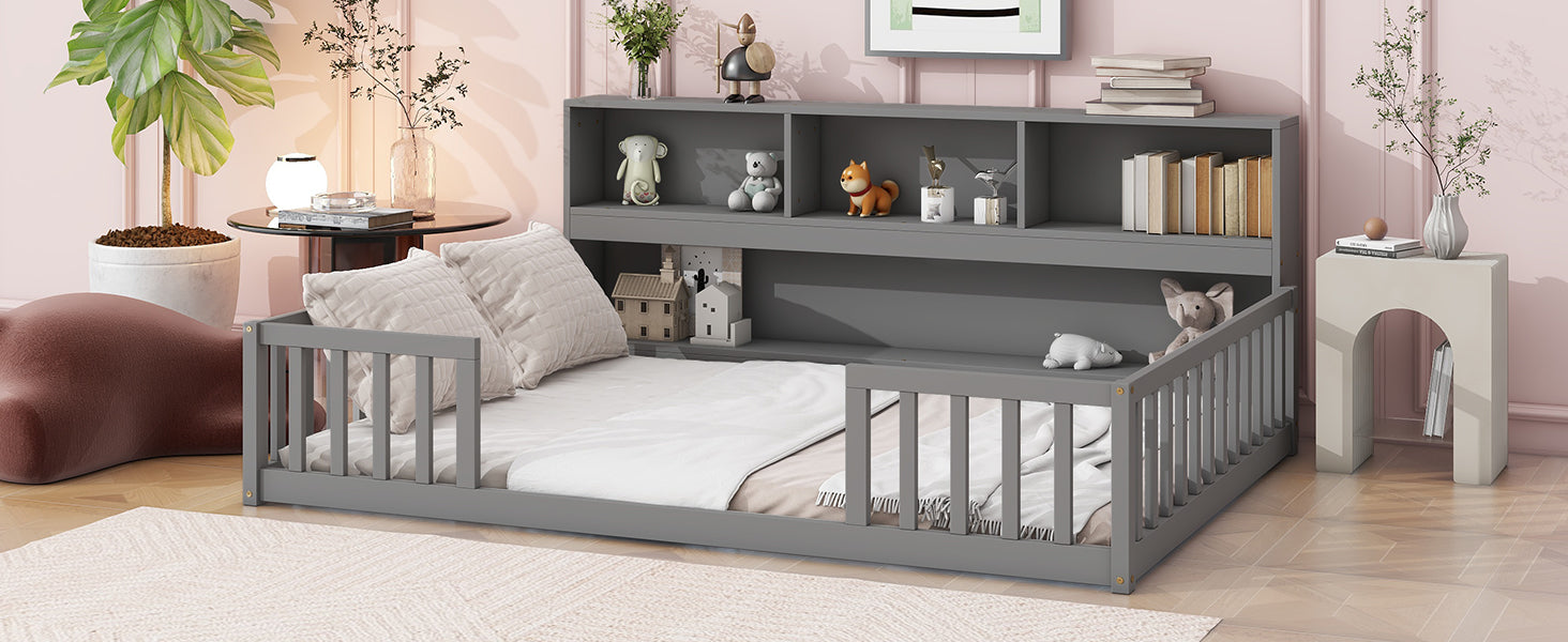 Gray wooden toddler bed with guardrails and attached bookshelf