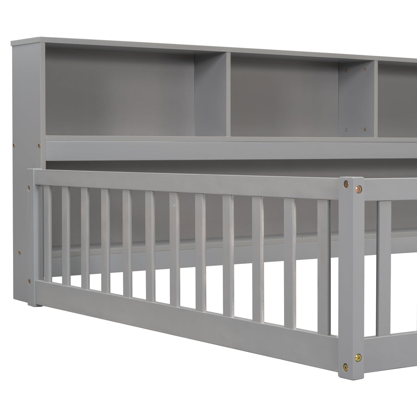 Gray wooden toddler bed frame with attached bookshelf headboard and safety rails
