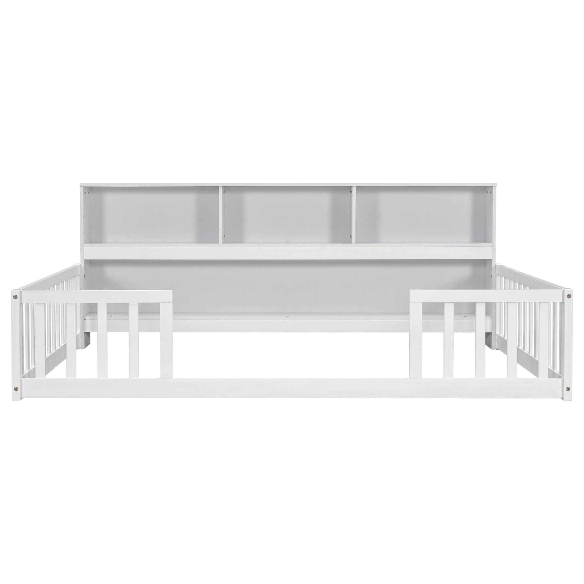 White wooden toddler bed with safety rails and integrated bookshelf headboard